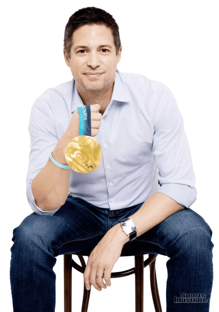 Steve Mesler Posing with his Gold Medal